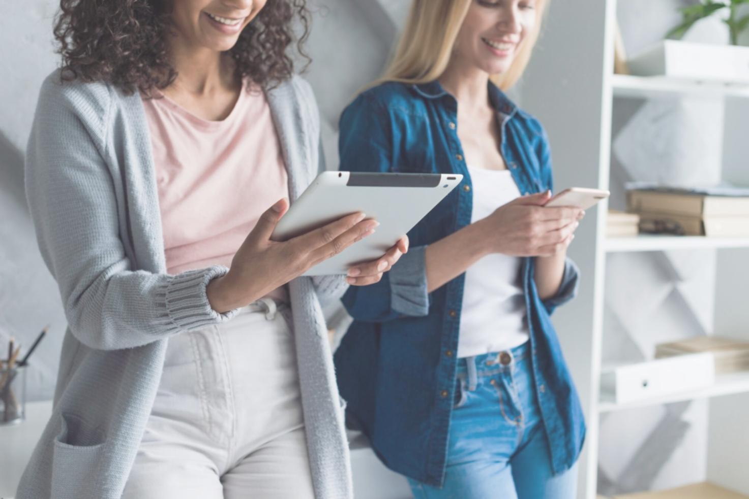 Hands working with financial documents and planning tools